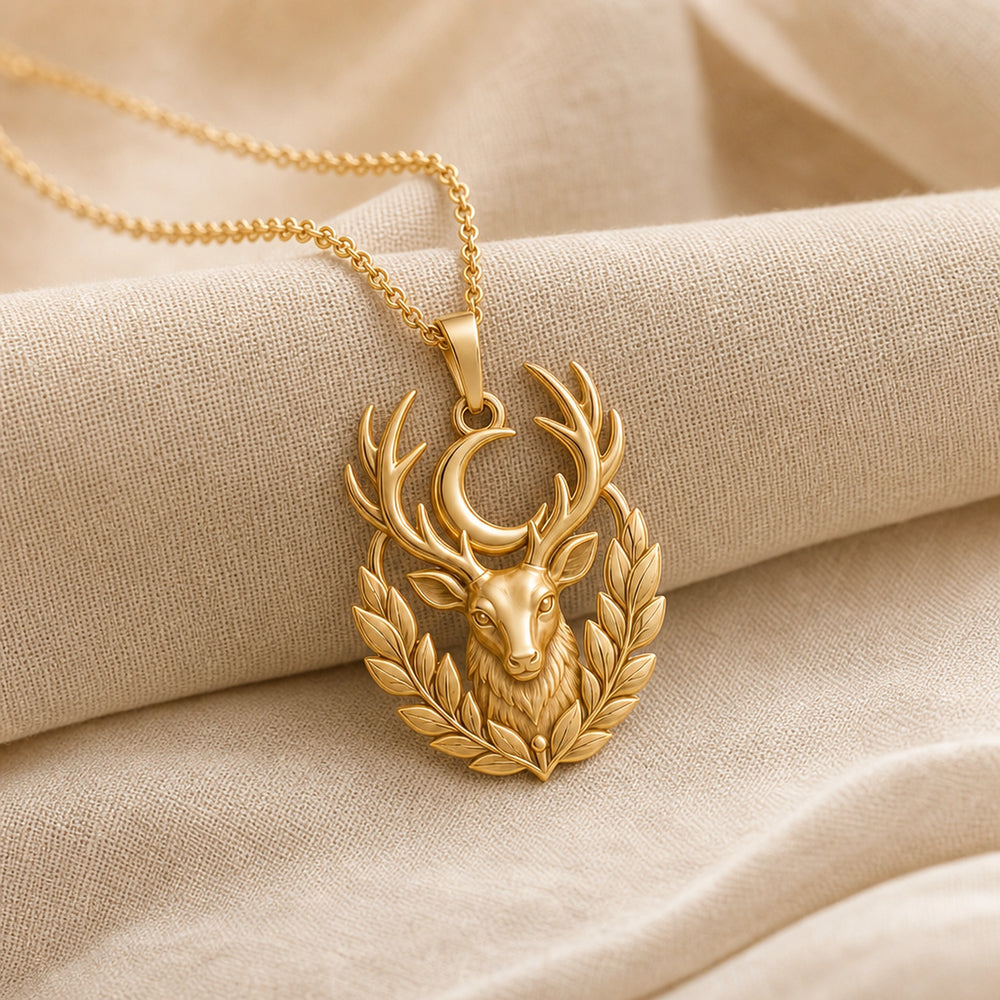 Moonleaf stag pendant necklace in 925 sterling silver with a raised deer head, branching antlers, crescent moon, and detailed leaf wreath in a warm yellow-tone finish. Gold finish.