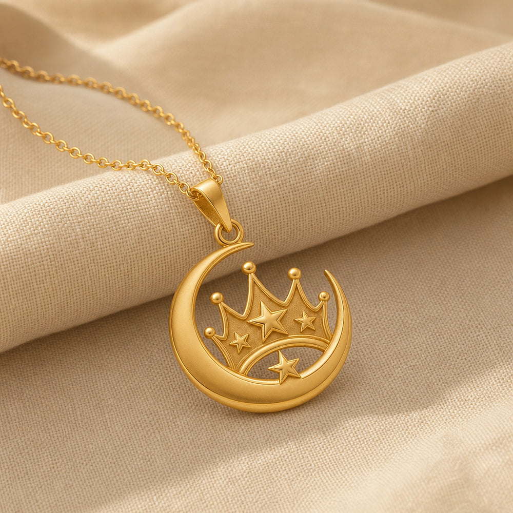 Royal moonstar crown pendant in 925 sterling silver with a polished crescent moon surrounding a raised crown, dimensional star accents, and a detailed celestial design. Gold finish.