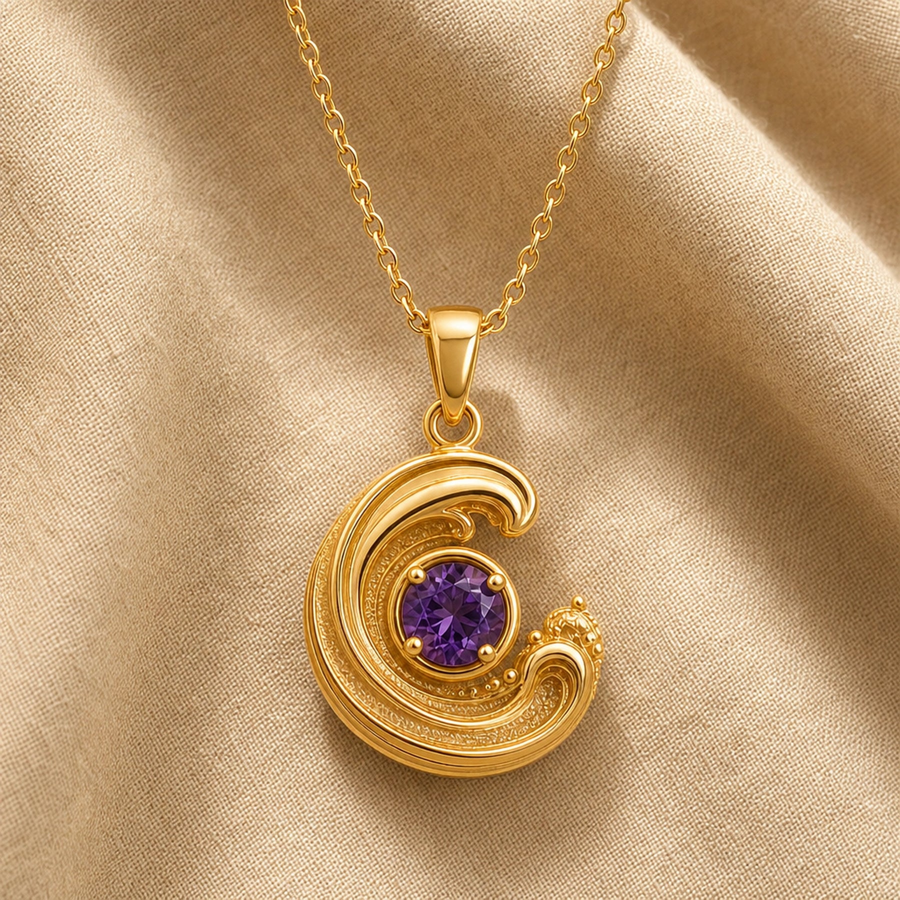 925 sterling silver wavecrest pendant curling around a round purple amethyst centerpiece with flowing textured details. Gold finish.