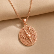 925 sterling silver oval quasar relief pendant with orbital rings, textured celestial details and a raised star. Rose gold finish.