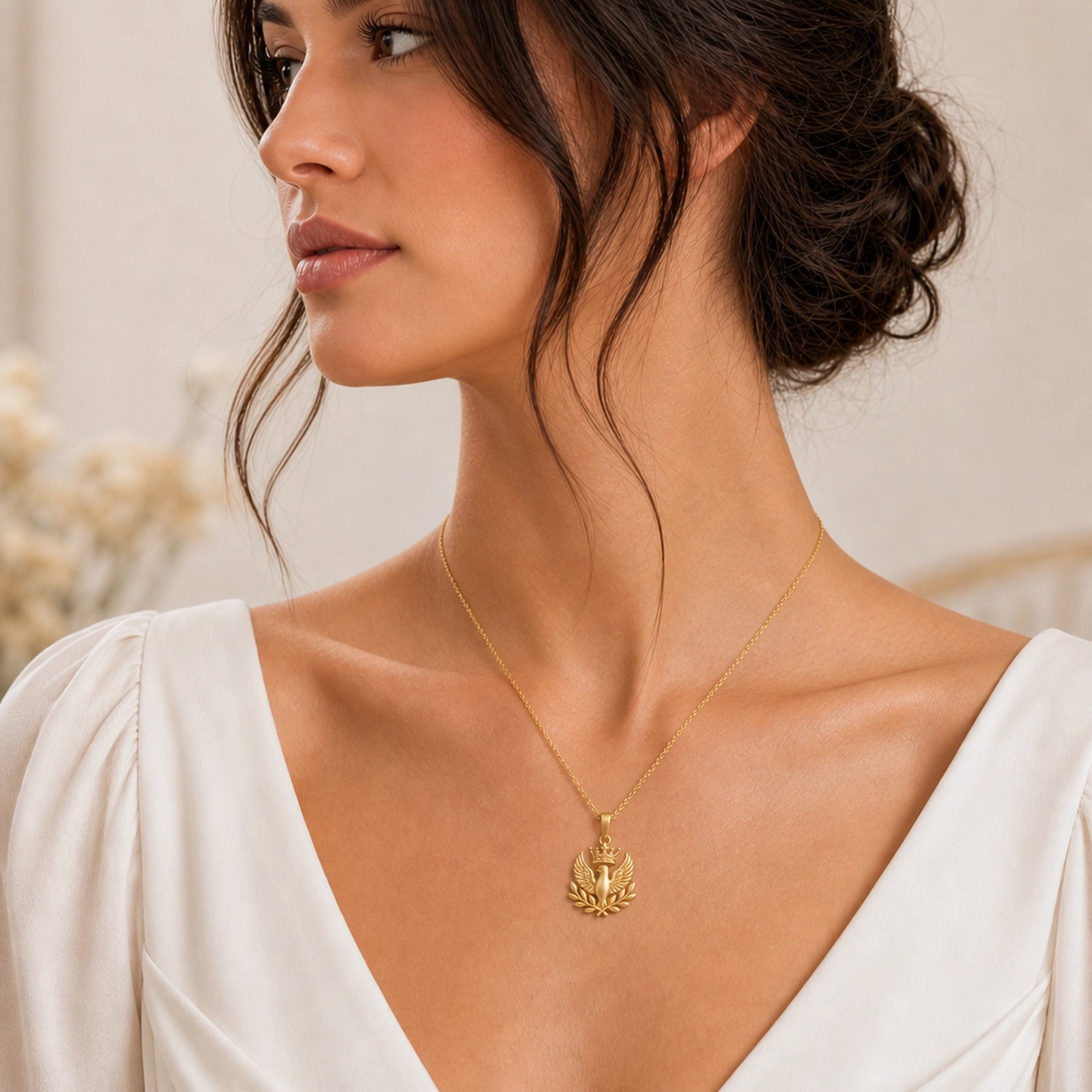 Regal olive dove crown pendant in 925 sterling silver, showing a raised dove with spread feathered wings, a detailed crown above, and crossed olive branches below without a gemstone setting. Worn on a model, angled view.