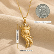 Star-crowned comet pendant with a raised central star, smaller stars along layered sweeping comet trails, and a detailed beaded crown in a warm yellow-toned finish. Product dimensions and measurements.