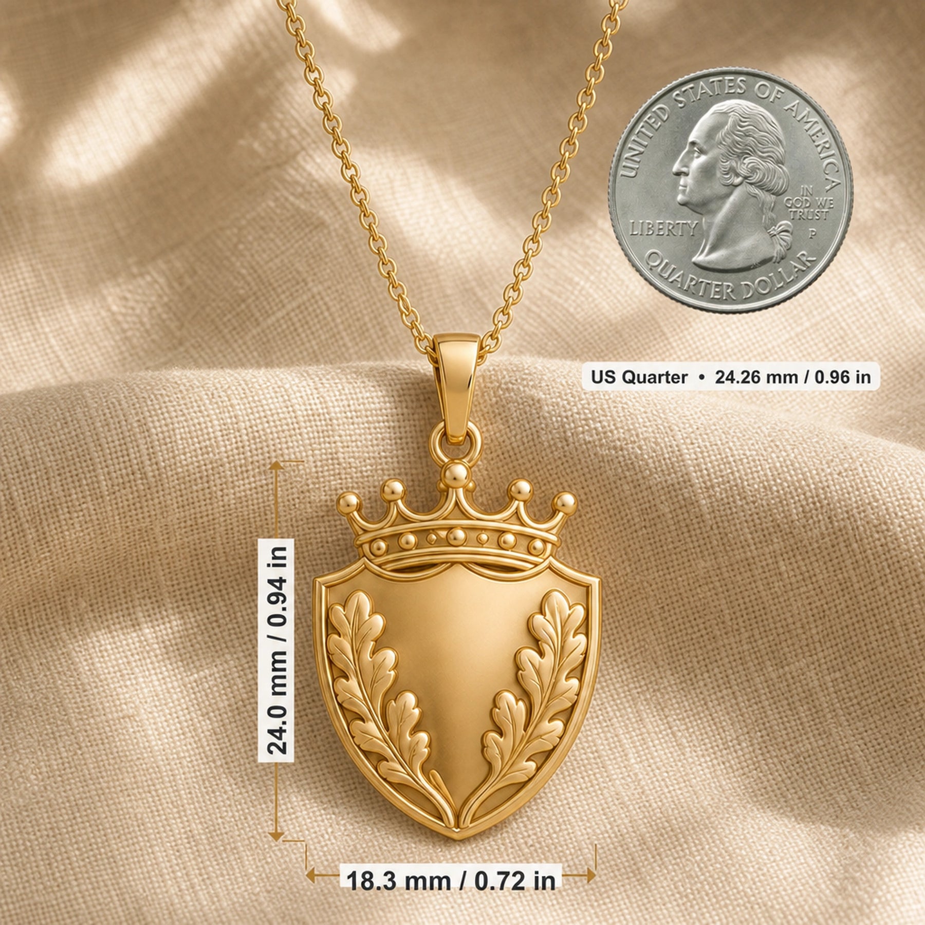 Oakleaf crown shield pendant with a pointed shield shape, raised botanical leaf relief, detailed crown top, smooth center panel, and a polished cable chain. Product dimensions and measurements.