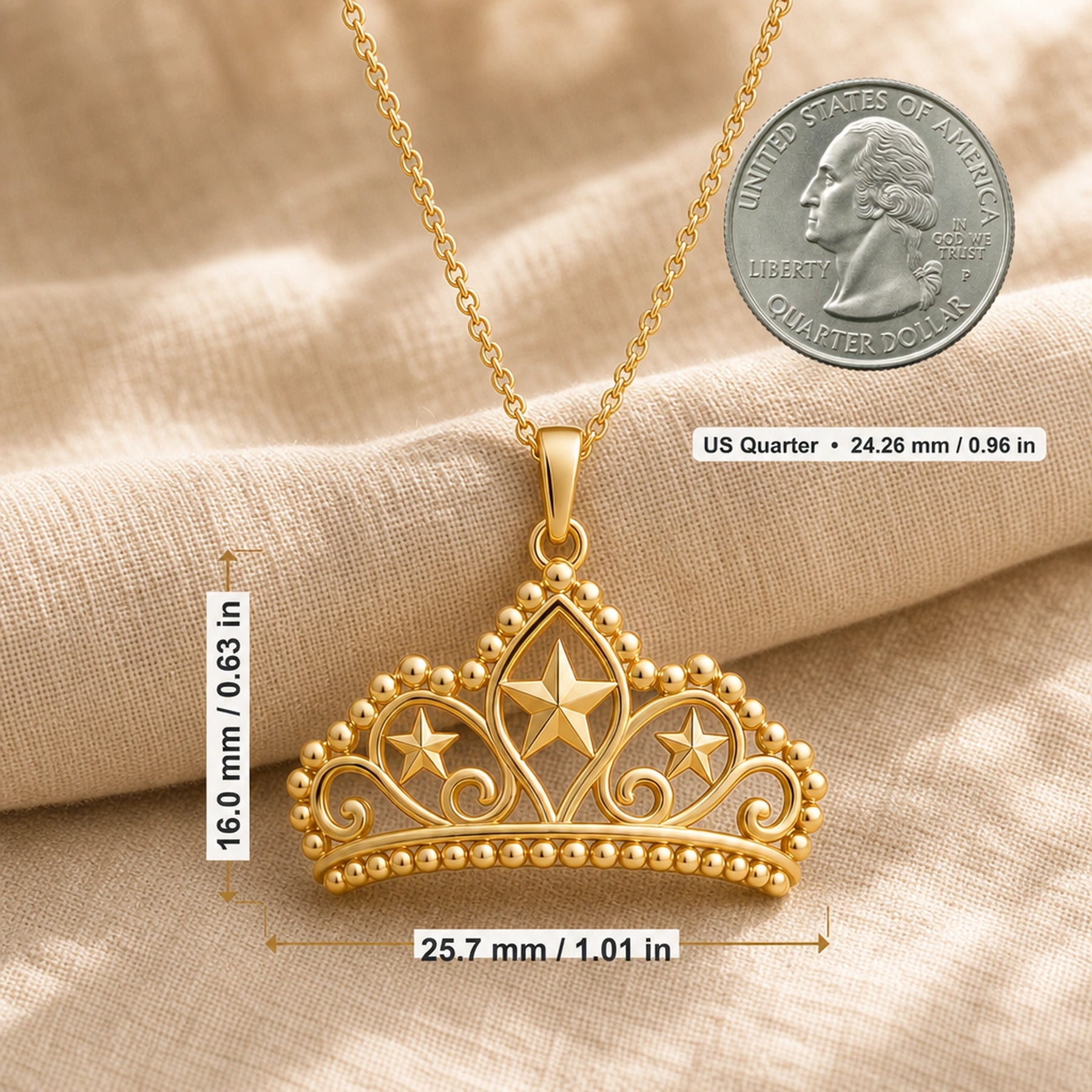 Pearl-bordered star tiara pendant with three raised star motifs, ornate openwork scrollwork, rounded bead edging, and a polished warm yellow-tone finish on a cable chain. Product dimensions and measurements.