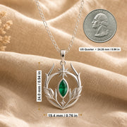 Emerald Elven Moonleaf pendant in 925 sterling silver, featuring a faceted marquise green stone set within an open crescent of sculpted leaves and a small star detail. Product dimensions and measurements.