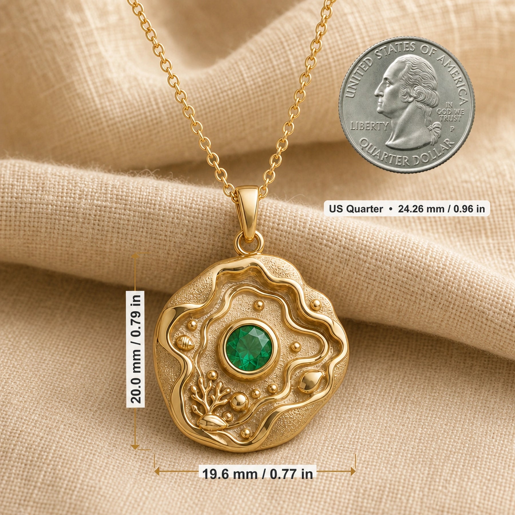 Emerald tide pool pendant necklace with a faceted green center stone in a bezel setting, surrounded by layered wave relief, shell details, coral-inspired accents, and textured ocean motifs. Product dimensions and measurements.