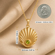 925 sterling silver Pearl Shell pendant with raised fan-shaped fluting and a round green peridot centerpiece. Product dimensions and measurements.