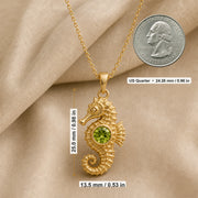 925 sterling silver seahorse pendant with a curled tail, sculpted marine details and a round green peridot centerpiece. Product dimensions and measurements.